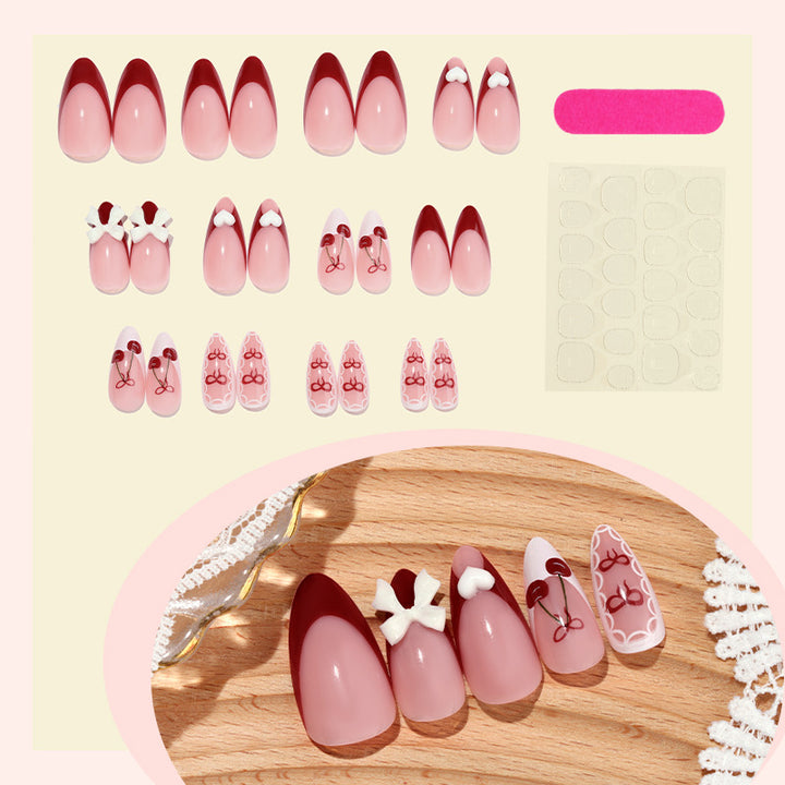 Dekorativer Druck-Nagel-Set mit charmanten Kirsch- und Schleifen-Designs Karnz