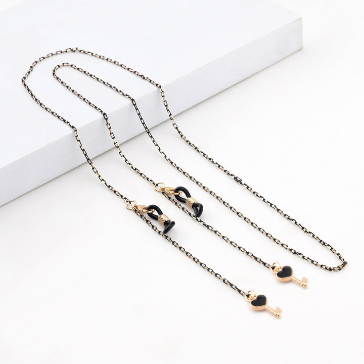 Elegante geometrische Brillenchnur Karnz