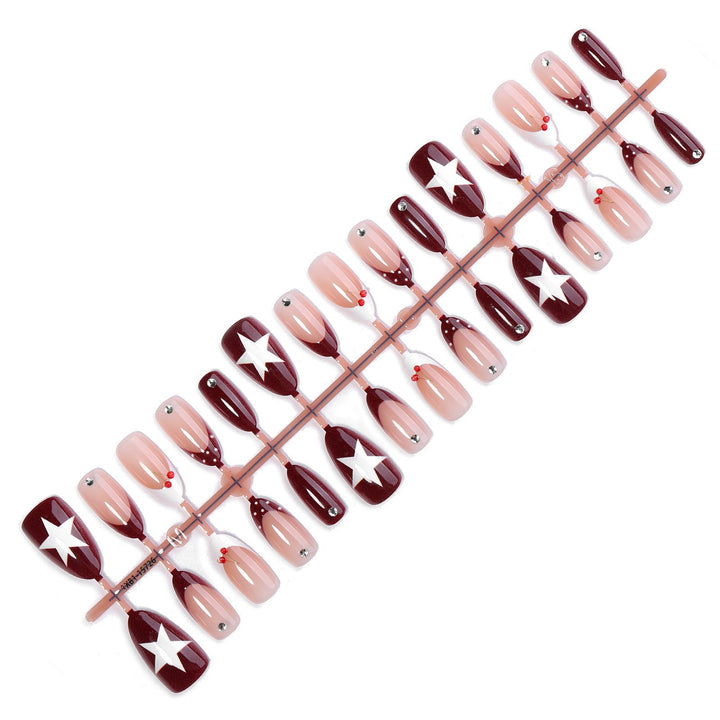 Kunstnagelset mit Sterne-Motiven Karnz