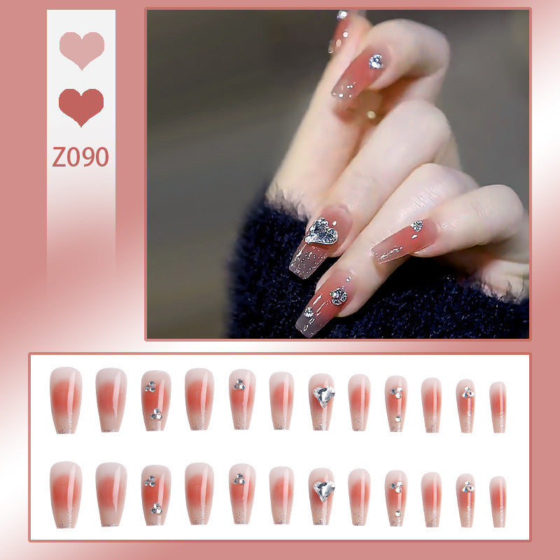 Kunstnagelset mit elegantem French-Tipp und Glitzerakzenten Karnz
