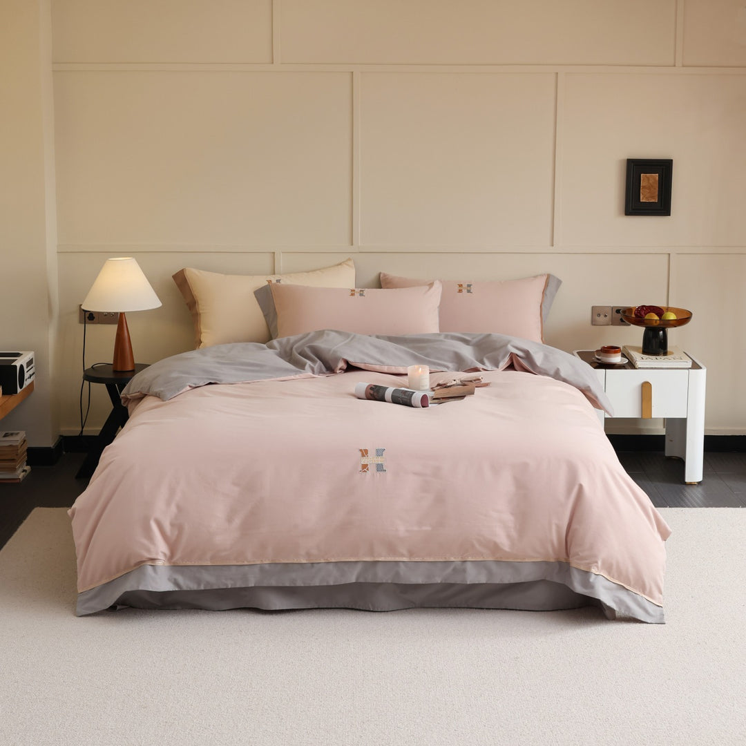 Zweifarbiges Luxus-Baumwoll-Percale-Bettwäsche-Set mit wendbarem Finish und besticktem Monogramm