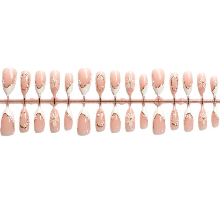 Elegantes Press-On-Nagelkunst-Set mit floralen Akzenten Karnz