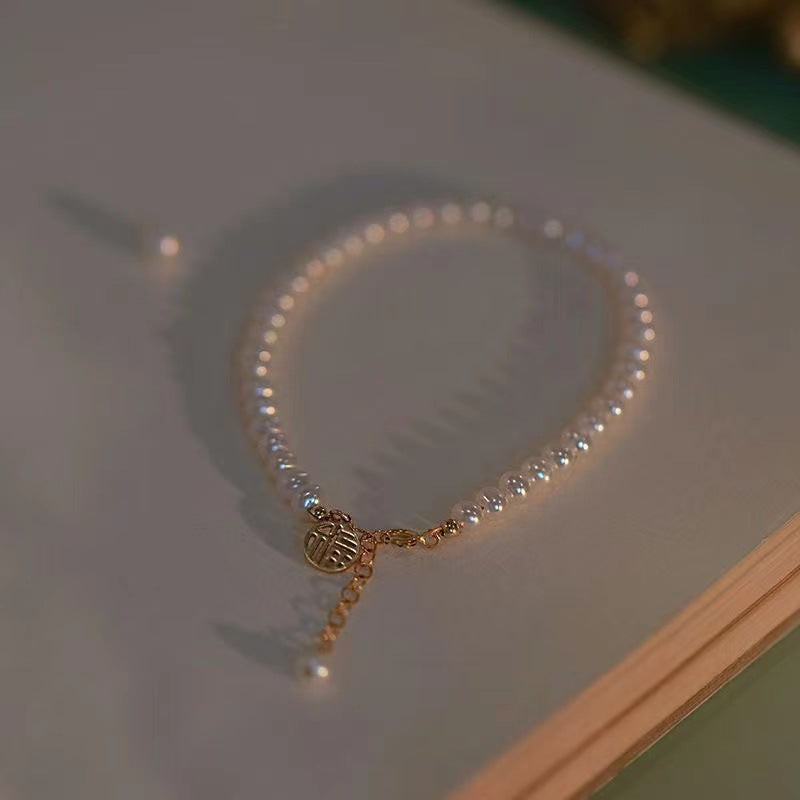 Elegante Perlen Charm Armband Karnz