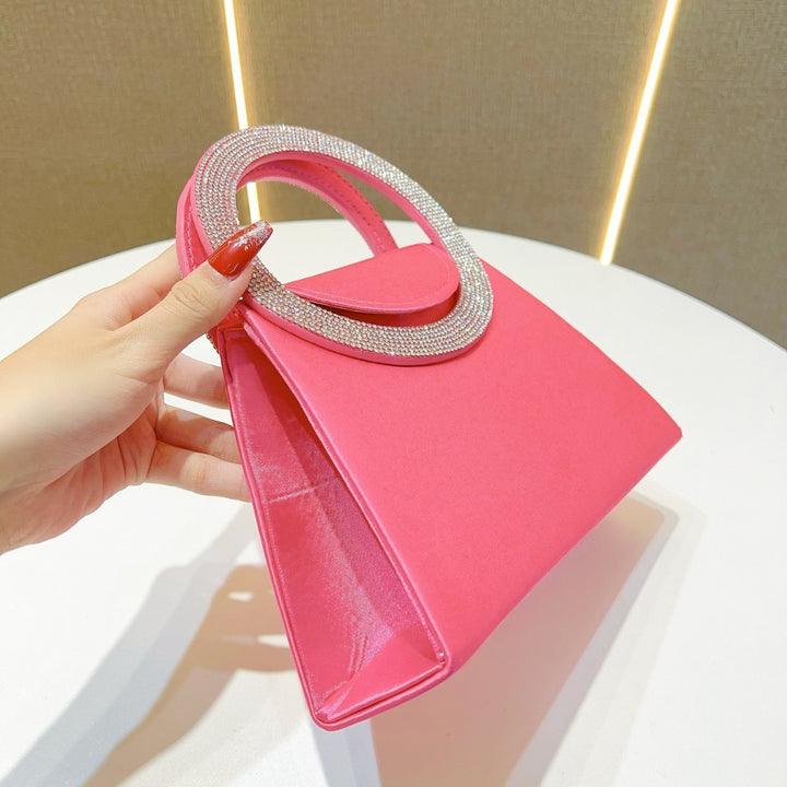 Elegante Handtasche mit Strassgriffen