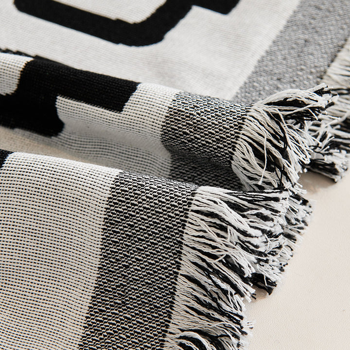 Elegante geometrische Muster-Wurfdecke