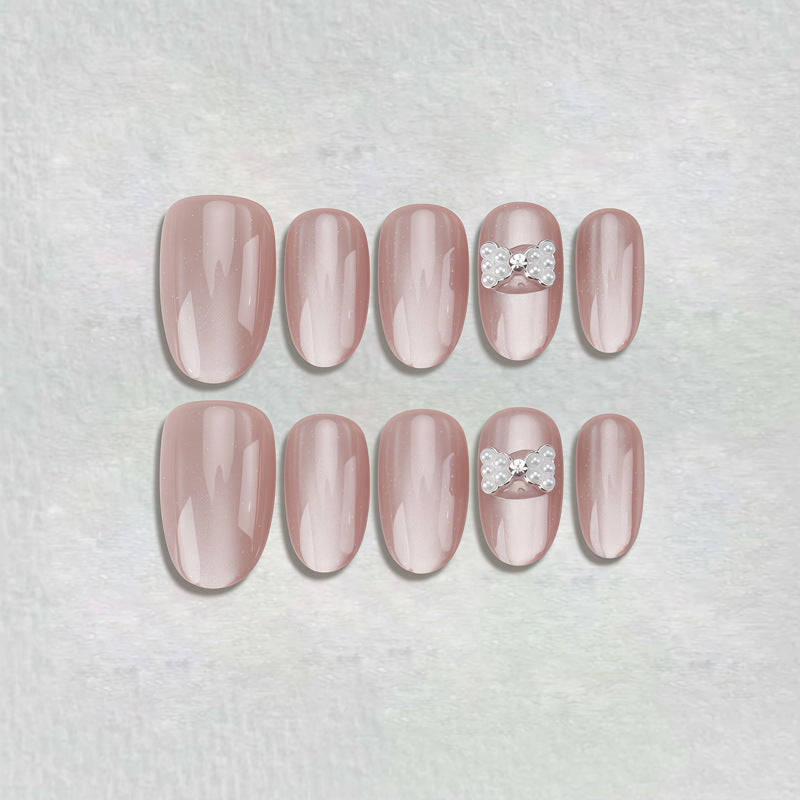 Dekoratives Press-On-Nagelset mit Stern- und Schleifenmotiven Karnz