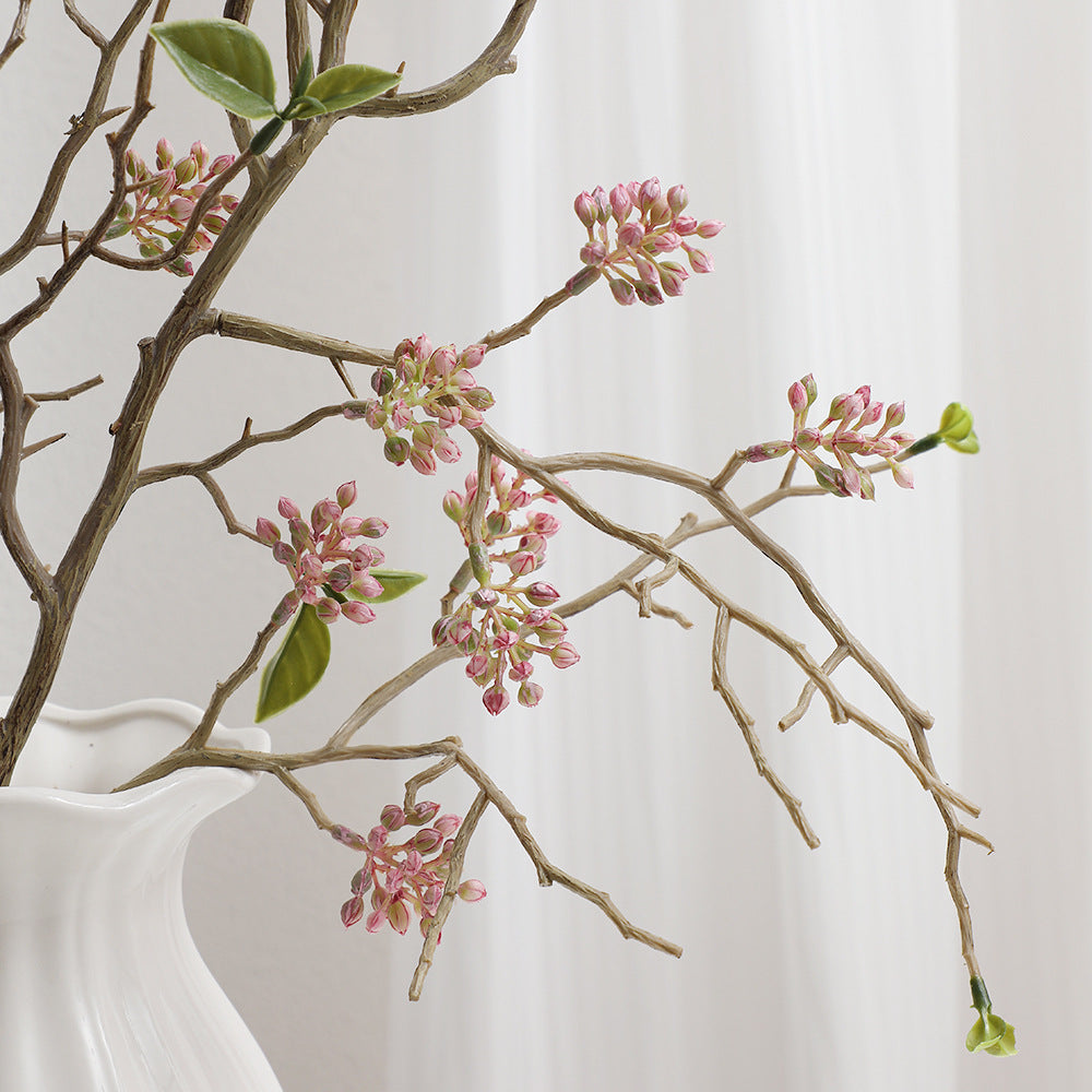 Dekorativer Kunstzweig mit detailverliebten Blüten Karnz
