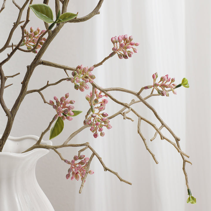 Dekorativer Kunstzweig mit detailverliebten Blüten Karnz