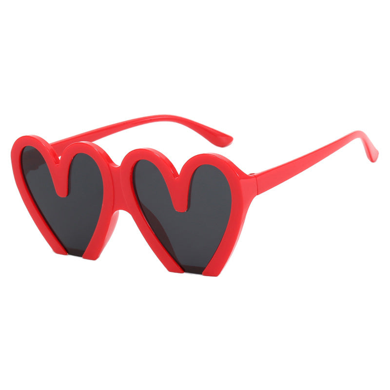Damen Herzförmige Sonnenbrille mit robustem Kunststoffrahmen und UV-Schutz Karnz