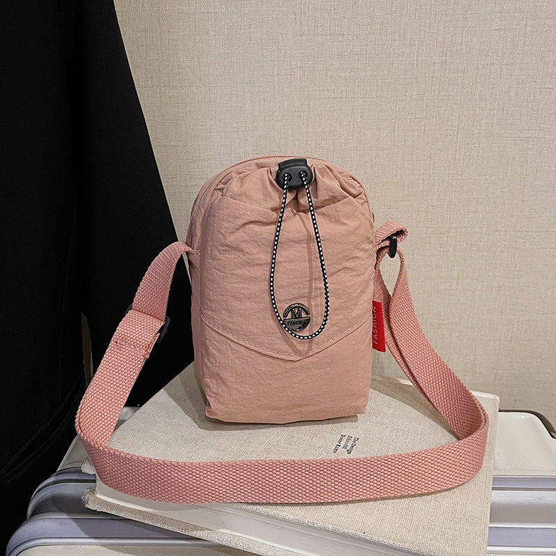 WoCompact Drawstring Crossbody Bag Karnz