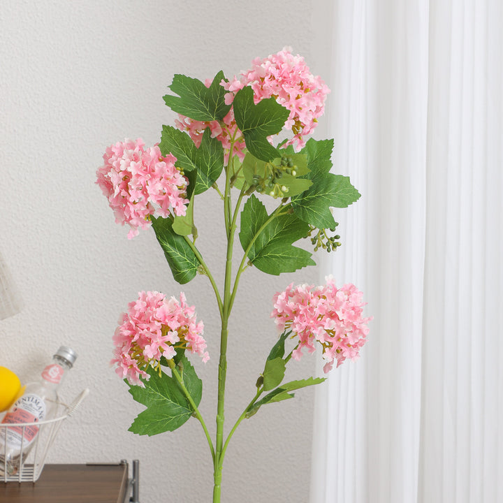 Künstlicher Hydrangeazweig mit lebhaften Blüten und detailreichen Blättern Karnz