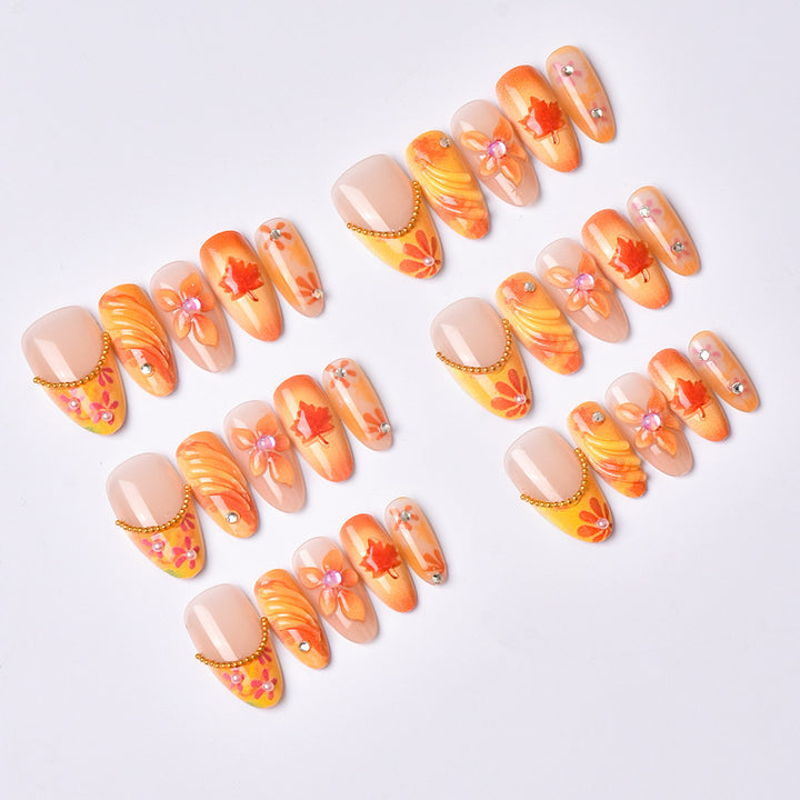 Künstlerisches, blumenmotiviertes Press-On Nail Set Karnz