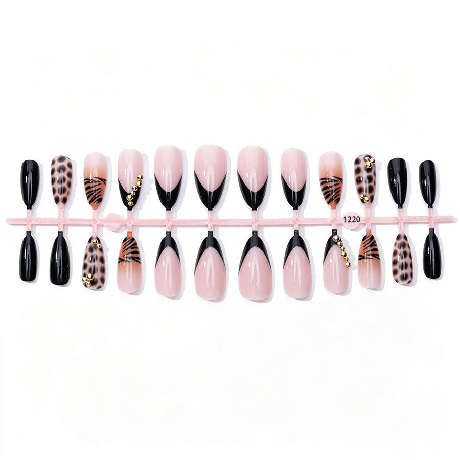 Kunstnagelset mit eleganten Tier- und Glitzermustern Karnz
