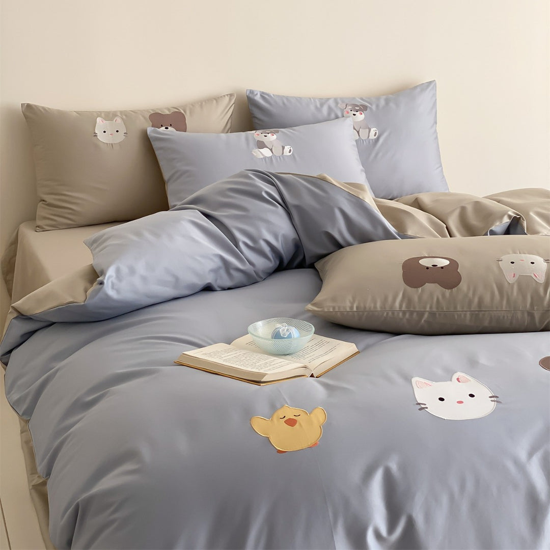 Verspielter Tierdruck Wendbare Baumwollsatin Bettbezug und Kissenbezug Set