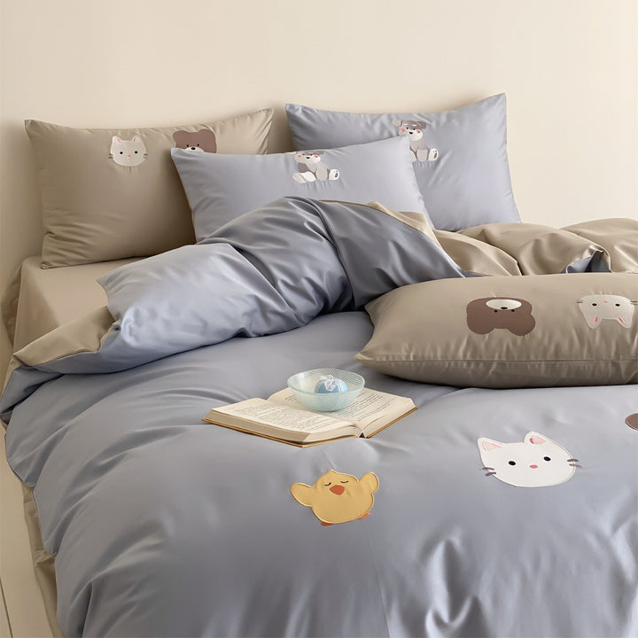 Verspielter Tierdruck Wendbare Baumwollsatin Bettbezug und Kissenbezug Set