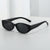 Damen modische Sonnenbrille mit geschwungenem Design und eleganter Form Karnz