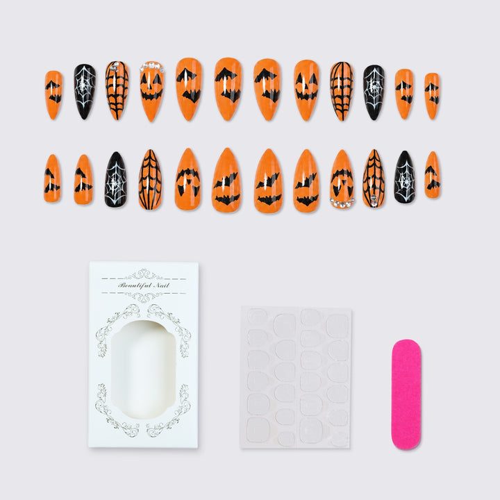 Kunstnagelset mit Halloween-Motiven und Glitzerelementen Karnz