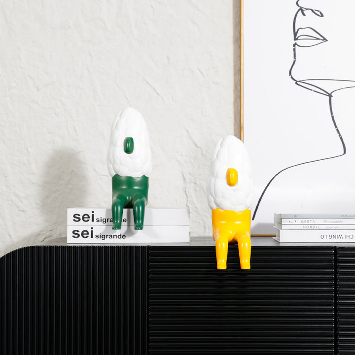 Dekorativer goldener und weißer Schaffigur