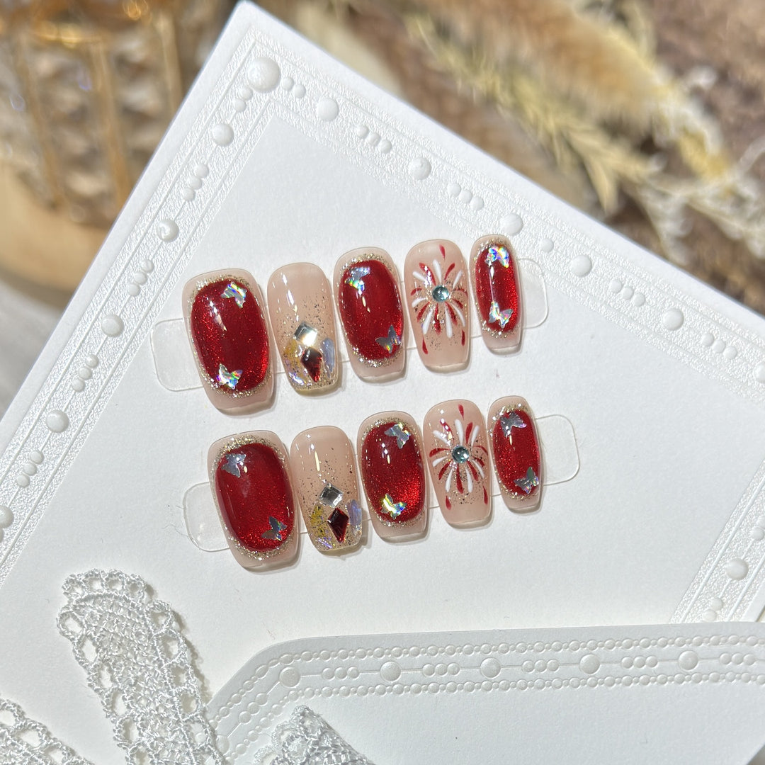 Künstlerisches Press-On Nail Set mit Glitzer und Sternelementen Karnz