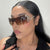 Damen futuristische Sportsonnenbrille mit verspieltem Design Karnz