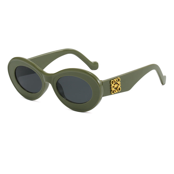 Damen modische Sonnenbrille mit ovalem Rahmen und goldenen Applikationen Karnz