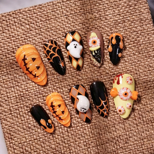 Kunstnagelset mit Halloween-Motiven und festlichen Designs Karnz