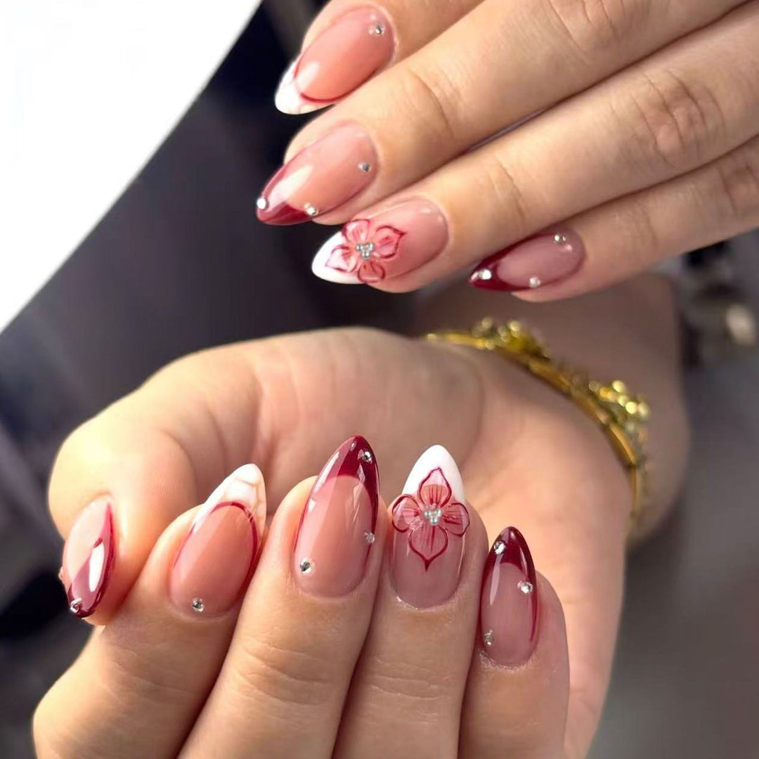 Kunstnagelset mit buntem Blumendesign und luxuriösen 3D-Verzierungen Karnz