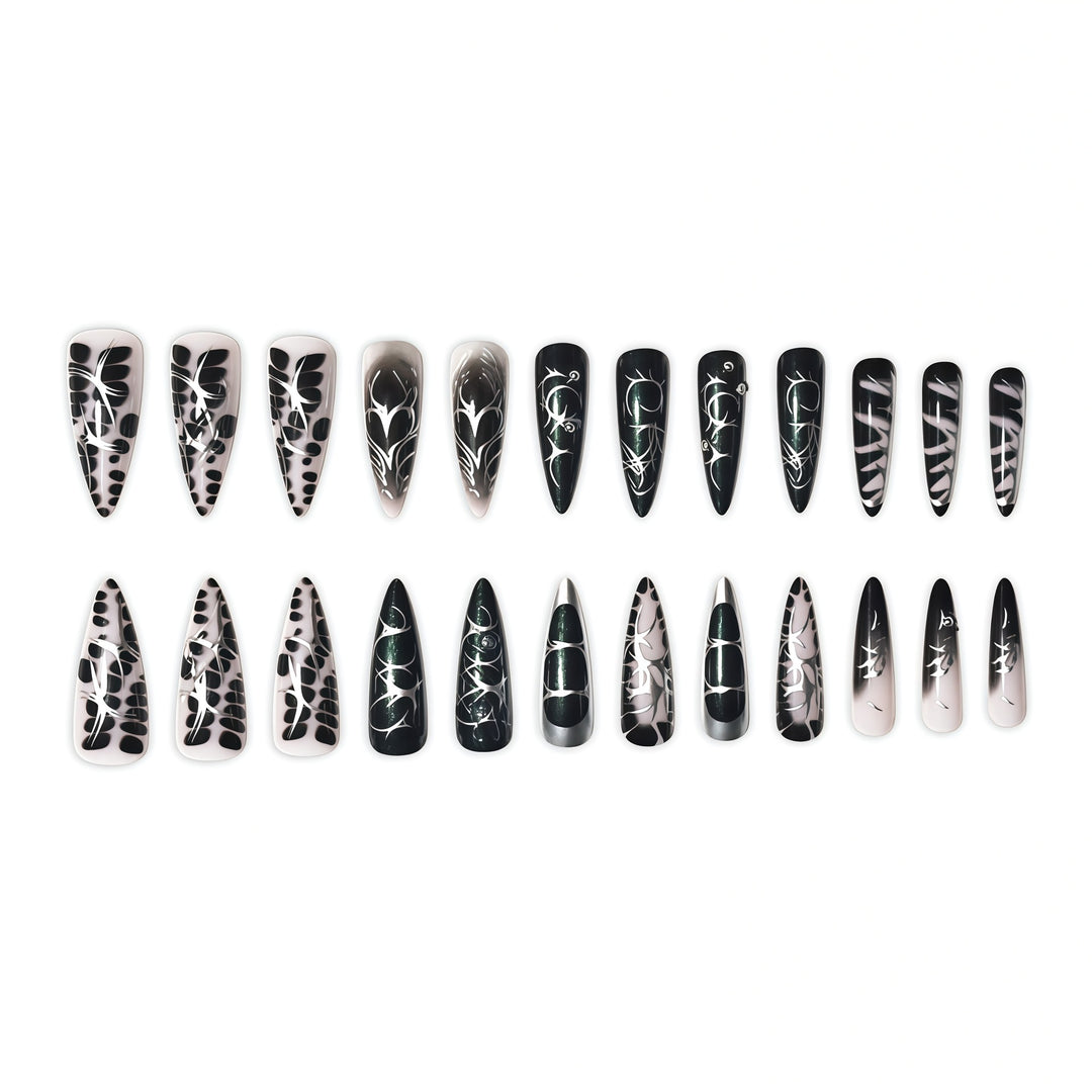 Elegante Stiletto-Nagelkunstverlängerungen mit aufwändigem Design Karnz