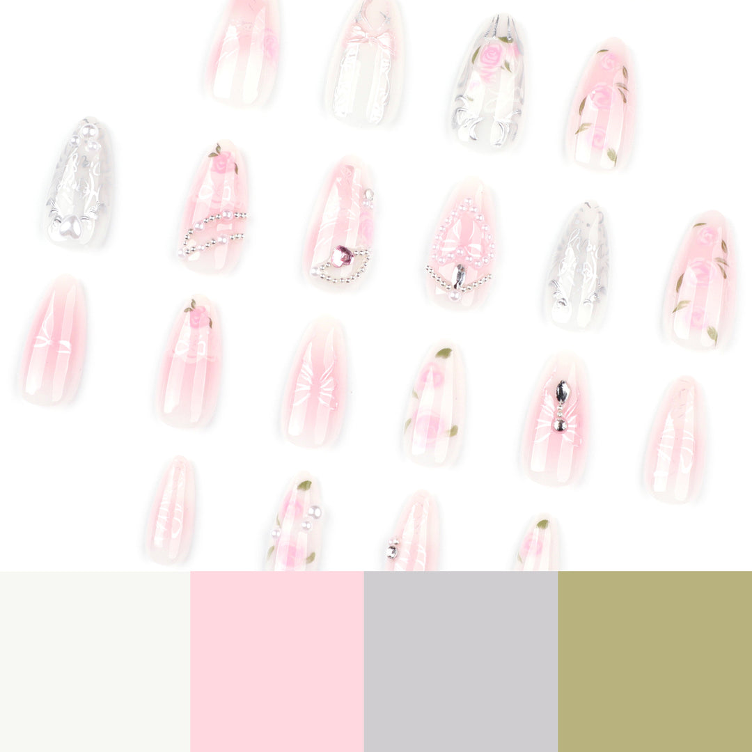 Künstlerische Nagelverlängerungen mit eleganter Blütenverzierung Karnz
