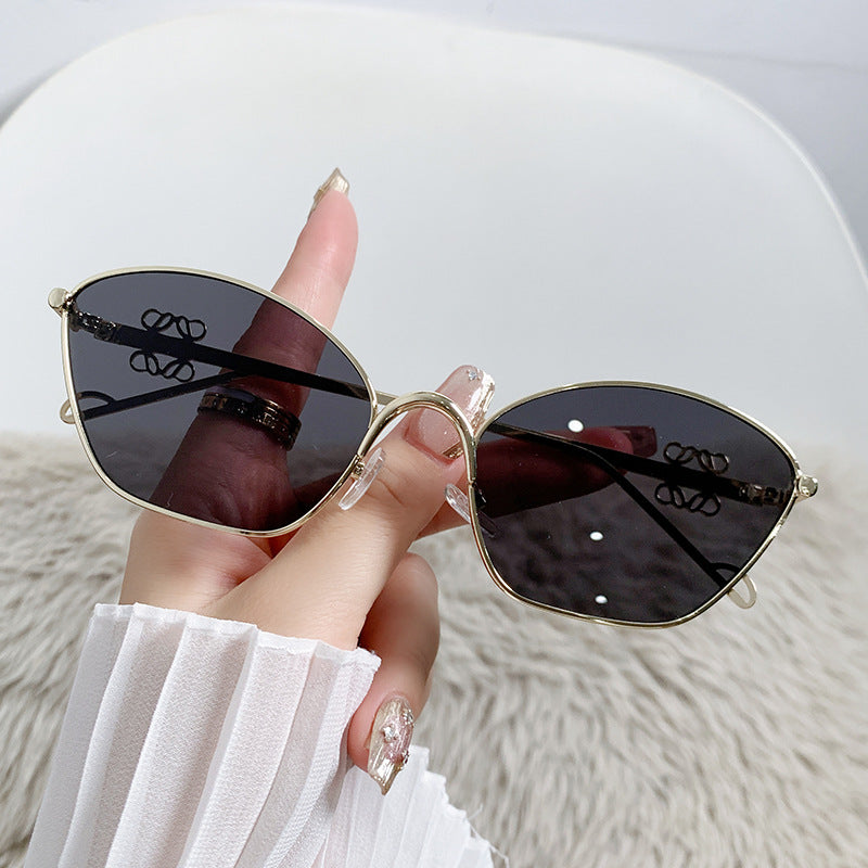 Damen modische Cat-Eye Sonnenbrille mit filigranem Metallrahmen Karnz