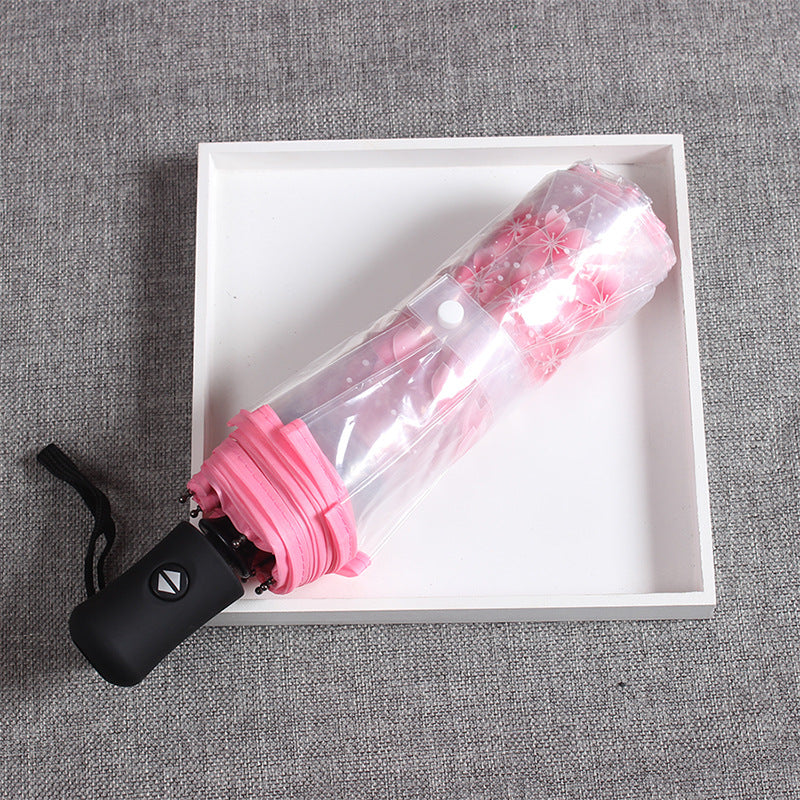 Damen eleganter und tragbarer Regenschirm mit floralem Design Karnz