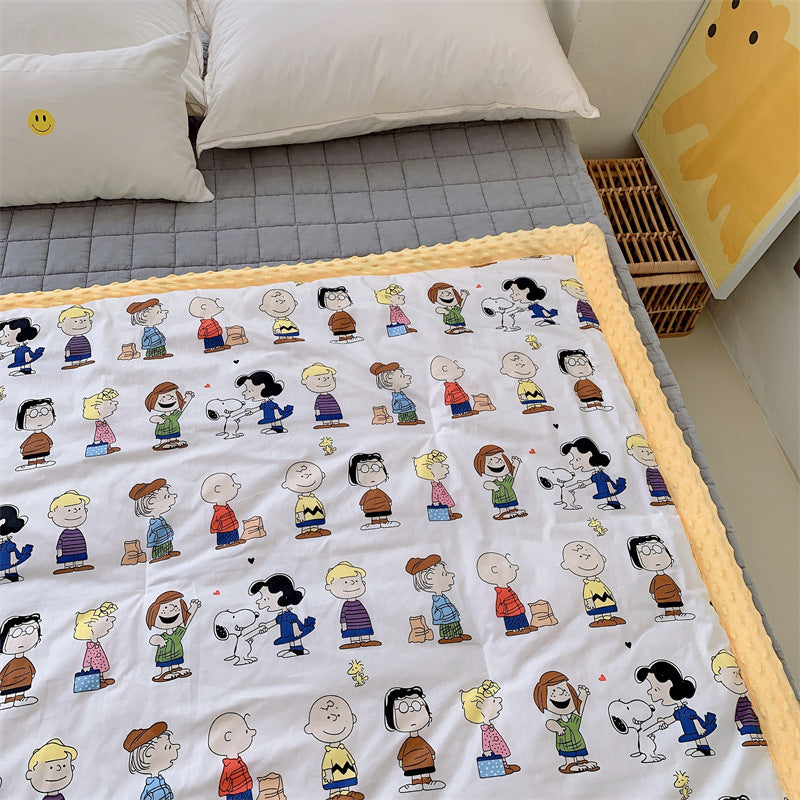 Kinder-Steppdecke mit buntem Dinosaurier-Print und weicher Minky-Borte