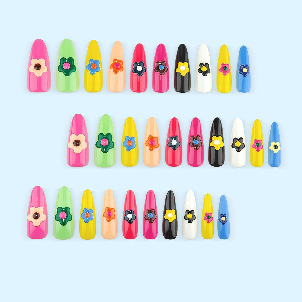 Kunstnagelset mit bunten Blütenmotiven Karnz