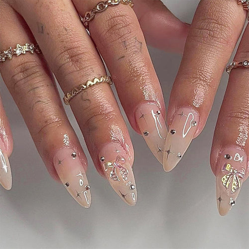 Künstlerisches Stiletto Press-On Nagelset mit dekorativen Edelsteindetails Karnz