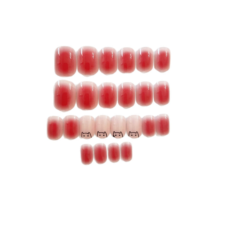 Kunstnägel mit elegantem Ombre-Effekt und verspieltem Katzenmotiv Karnz