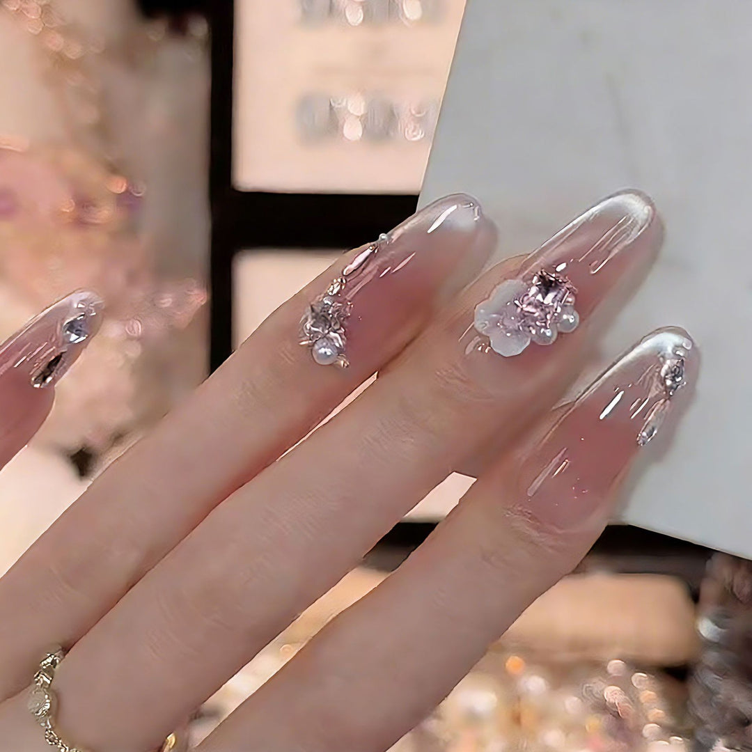 Kunstnagelset mit eleganten Glitzer-Akzenten Karnz