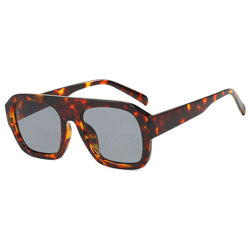 Damen modische Sonnenbrille mit robustem Rahmen und breiten Gläsern Karnz