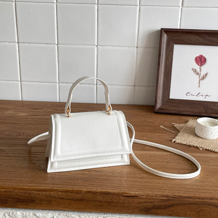 Strukturierte Mini-Crossbody-Handtasche