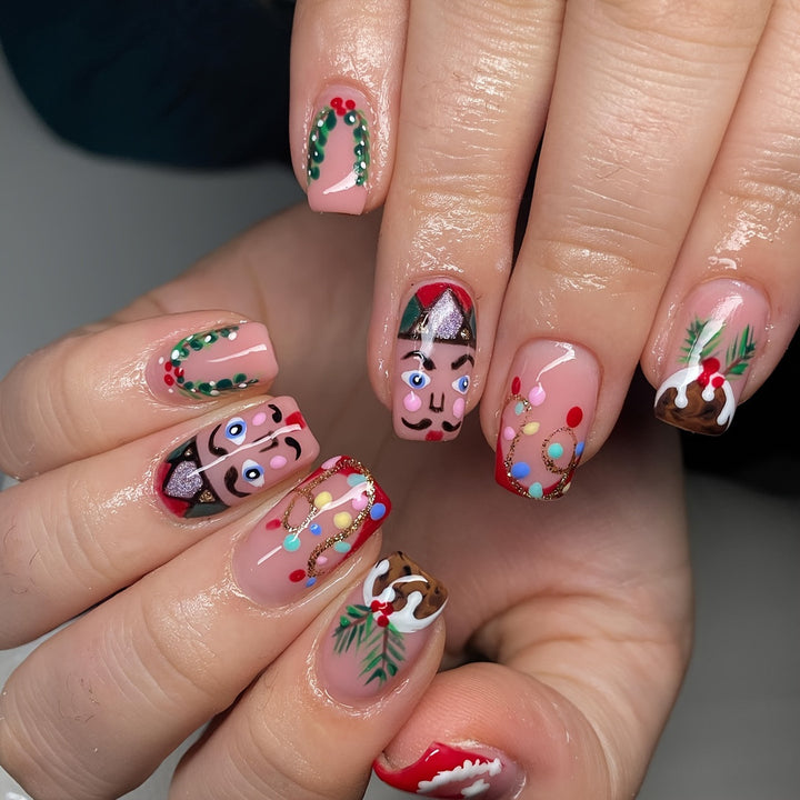 Kunstnagelset mit festlichen Weihnachtsmotiven Karnz