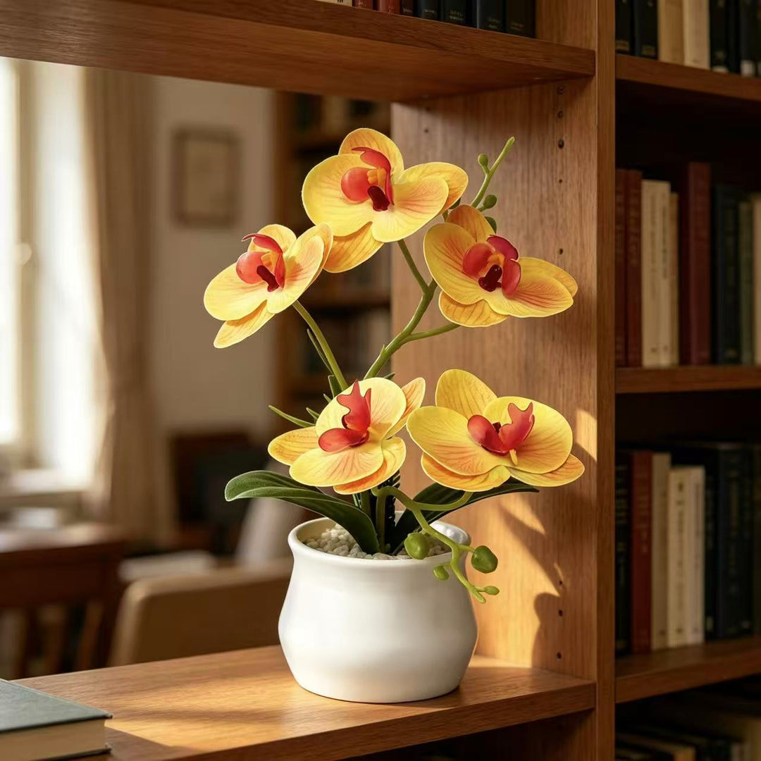 Elegante künstliche Orchideenpflanzenarrangement für die Wohnkultur