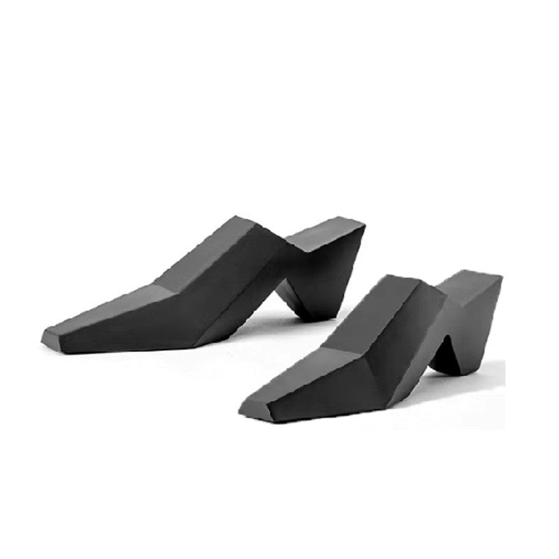 Skulpturale Absatz-Mules