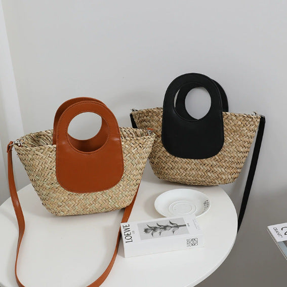 Damen Handtasche aus geflochtenem Material mit Lederdetails Karnz