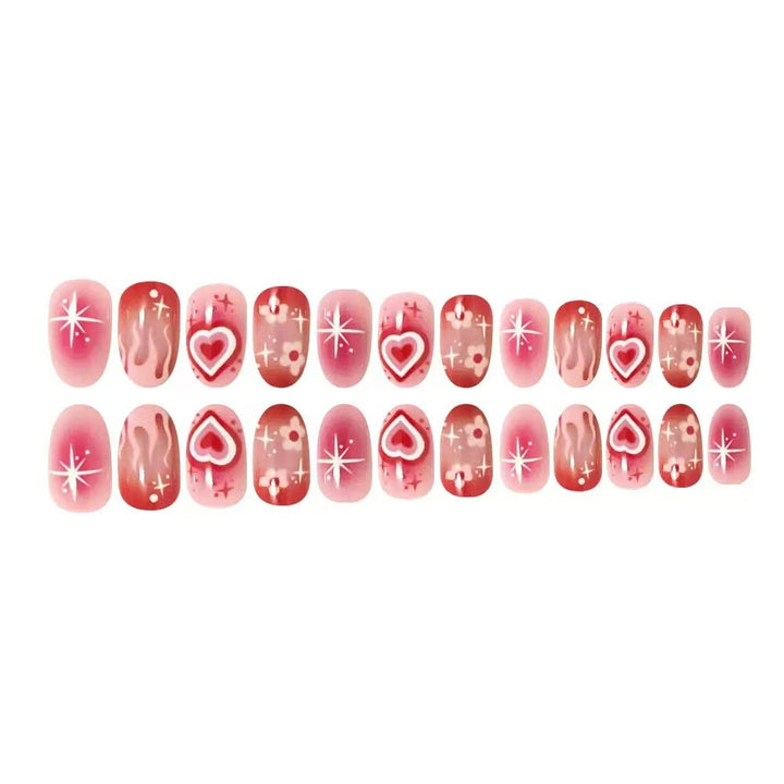 Kunstnagelset mit romantischen Herz-Design und glitzernden Akzenten Karnz