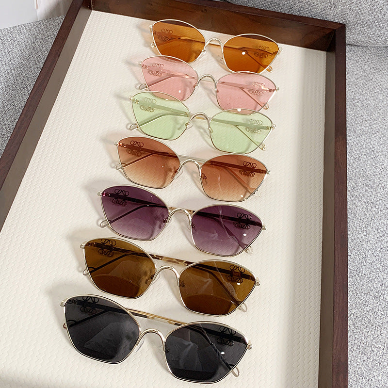 Damen modische Cat-Eye Sonnenbrille mit filigranem Metallrahmen Karnz