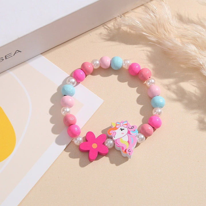 Verspieltes Kinderarmband mit Einhorn- und Blumenmotiv Karnz