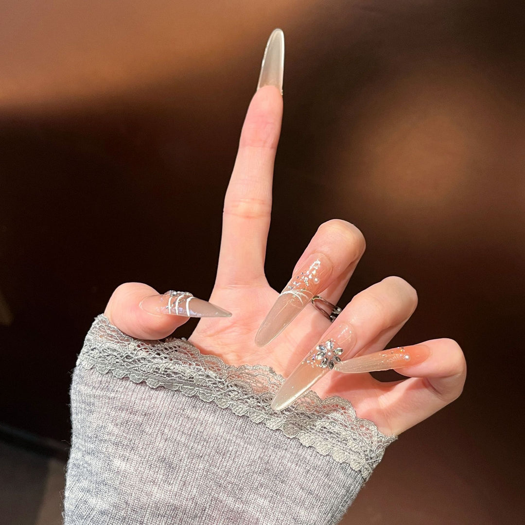 Elegante Stiletto Press-On Nagelverlängerungen mit Strass Karnz