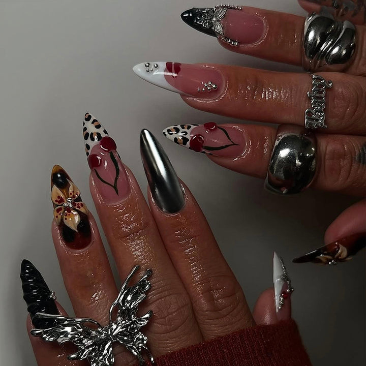 Kunstvolle Stiletto Fingernägel mit Einzigartigen Design-Elementen Karnz