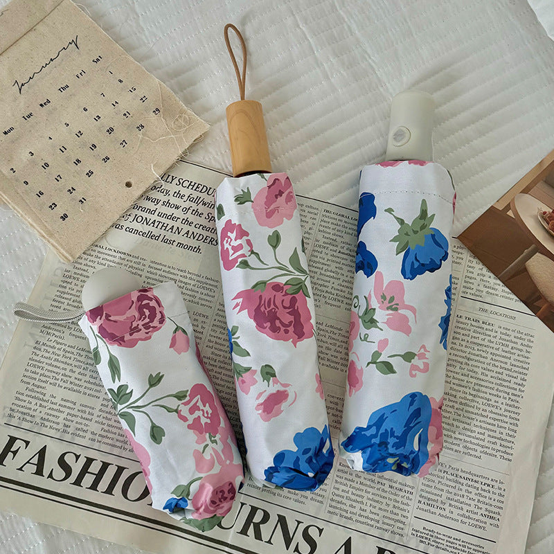 Damen Faltregenschirm mit hochwertigem Blumendesign Karnz