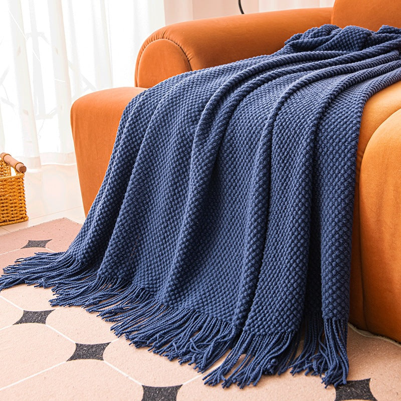 Strukturierte Strickwurfdecke