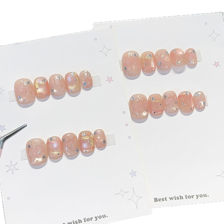 Glamouröse Kunstnagelspitzen mit Sternen Design Karnz
